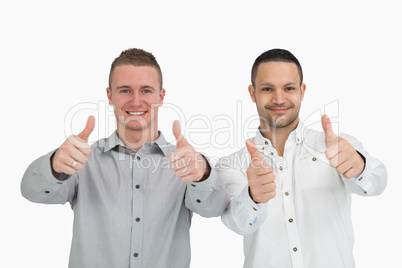 Men putting their thumbs up