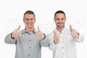 Men putting their thumbs up