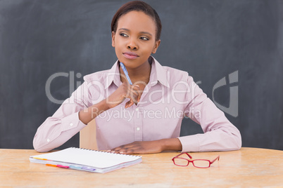 Teacher looking away while thinking
