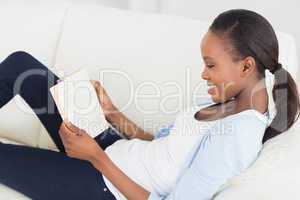 Black woman reading a book