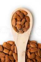 Wooden spoon with almonds