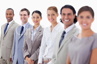 Close-up of happy business people looking straight