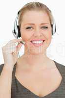 Smiling woman working in a call center