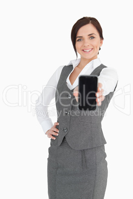 Businesswoman showing her smartphone screen