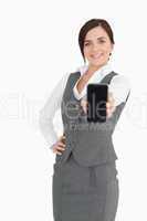 Businesswoman showing her smartphone screen