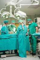 Team of surgeons working on a patient