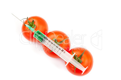 Syringe on tomatoes