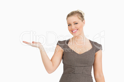 Woman presenting something with her hand