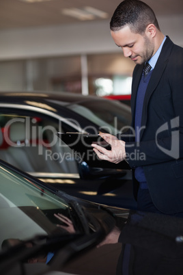 Salesman writing on a clipboard