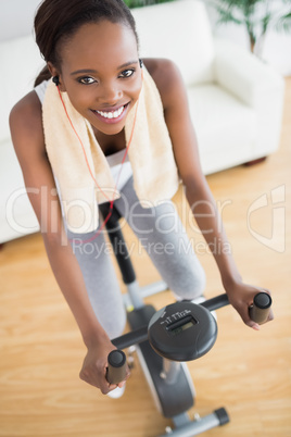 High view of a black woman on an exercise bike
