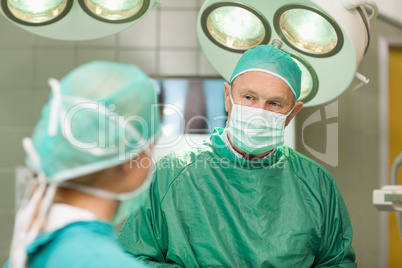 Two surgeons looking at each other