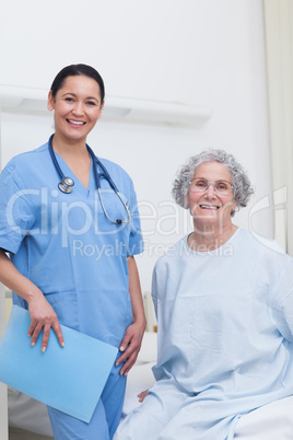 Patient sitting on a bed