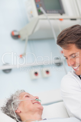 Patient smiling to a doctor