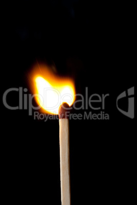 Close up of a match on fire