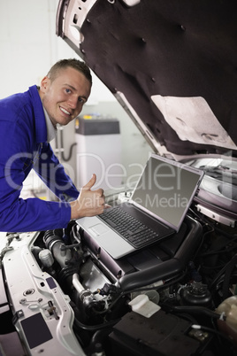 Mechanic working on a computer