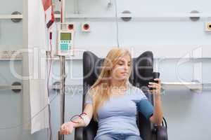 Woman receiving a blood transfusion