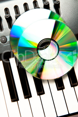Close up of a compact disc on a synth