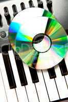 Close up of a compact disc on a synth