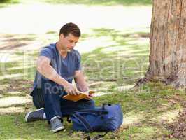 Student reading a textbook