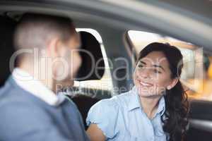 Couple smiling in a car