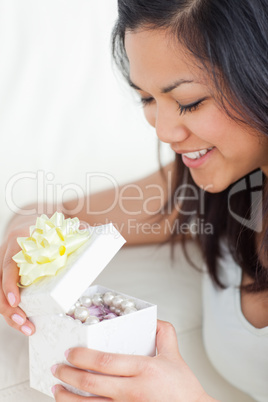 Close-up of a woman looking in an open gift box