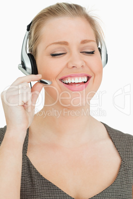 Woman speaking with her headset