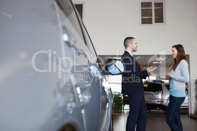 Salesman speaking with a client