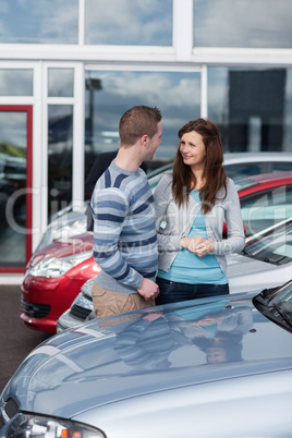 Couple buying a car