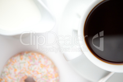 Cup of coffee with a doughnut Cup of coffee with a doughnut