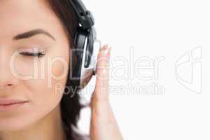 Woman the eyed closed enjoying music