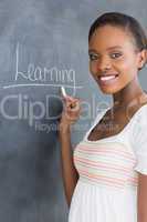 Black woman showing the blackboard