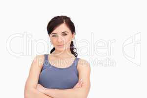 Brunette with folded arms