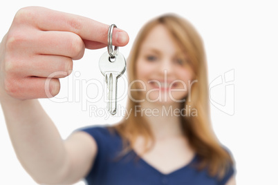 Focus shot on a woman holding a key