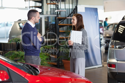 Man speaking with a businesswoman