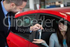 Client receiving car keys