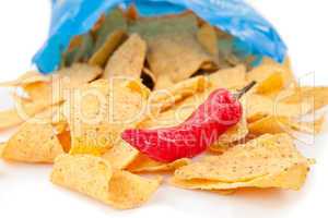 Open bag of crisps with a red pimento