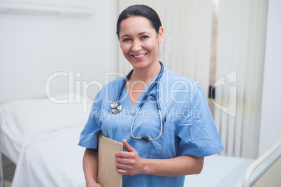 Nurse holding a medical folder