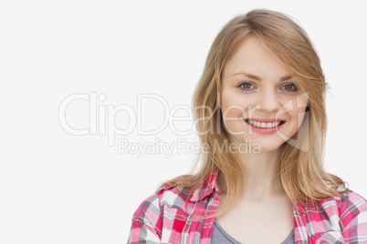 Blonde woman looking at camera while smiling
