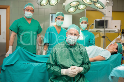 Surgical team around a patient