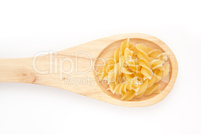 Wooden spoon with pasta