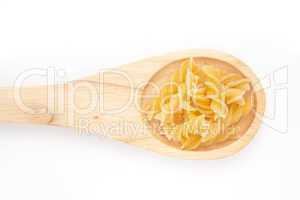 Wooden spoon with pasta