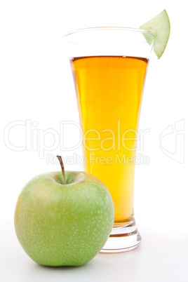 Apple near a glass of apple juice