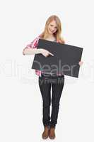 Woman showing a black board