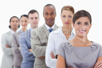 Close-up of a business team in a single line crossing their arms