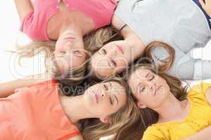 Four girls sleeping on the floor together