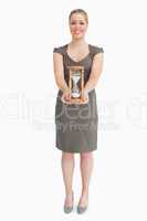 Woman holding a hourglass