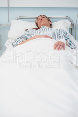 Woman sleeping on a bed