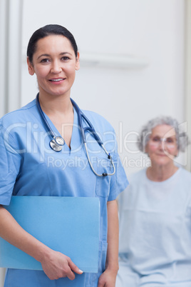 Nurse holding a folder