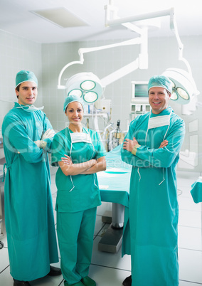 Surgeons smiling with arms crossed
