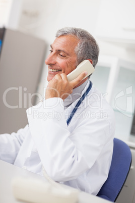Smiling doctor calling